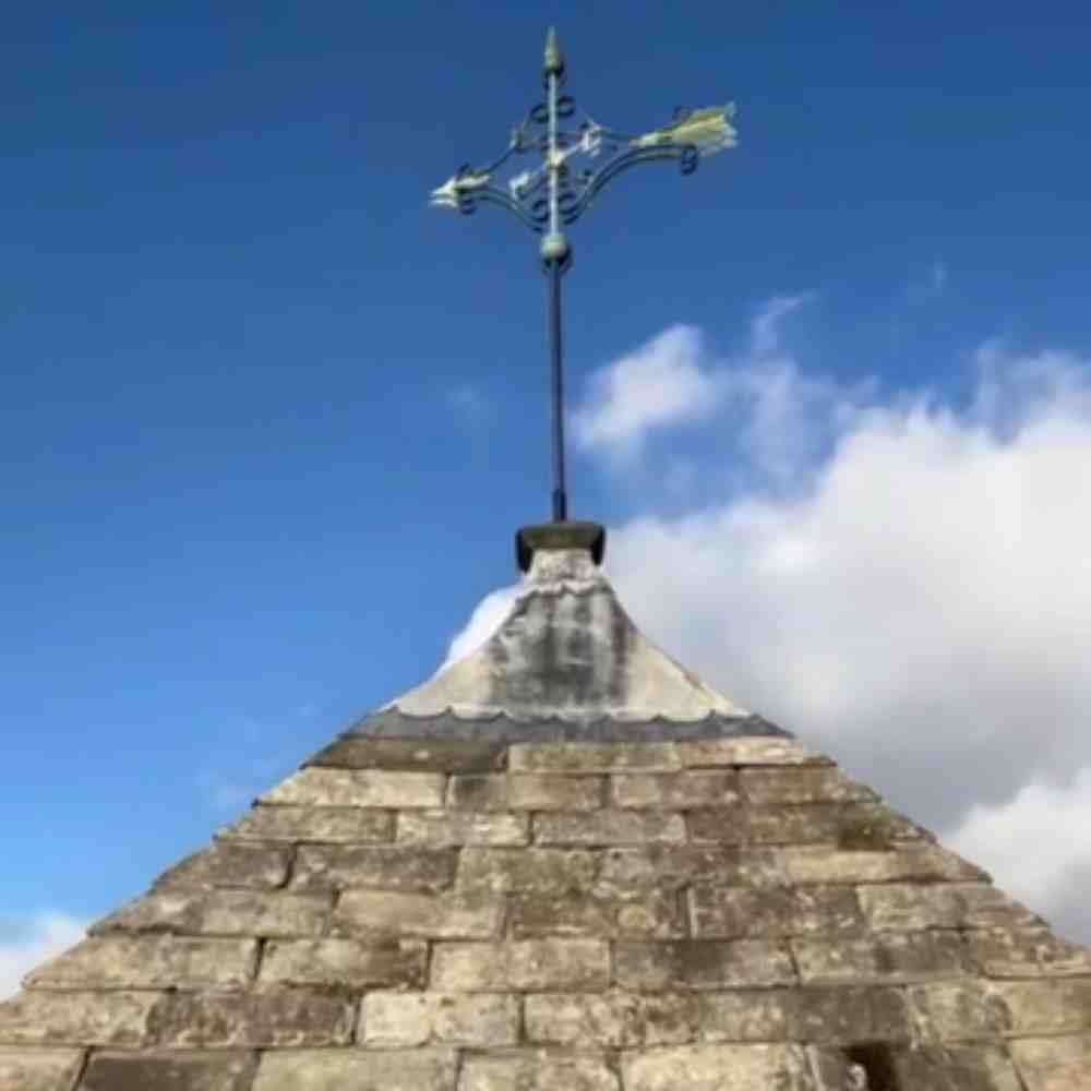 Victorian arrow weathervane installed on a historic building