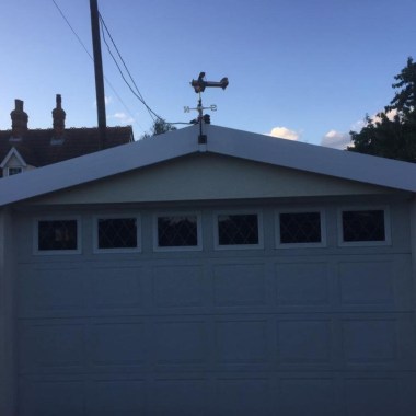 garage_with_biplane_weathervane